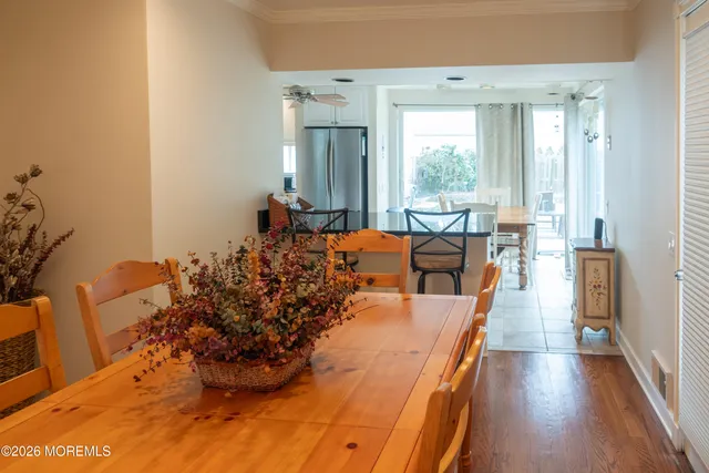a view of a living room and dining room