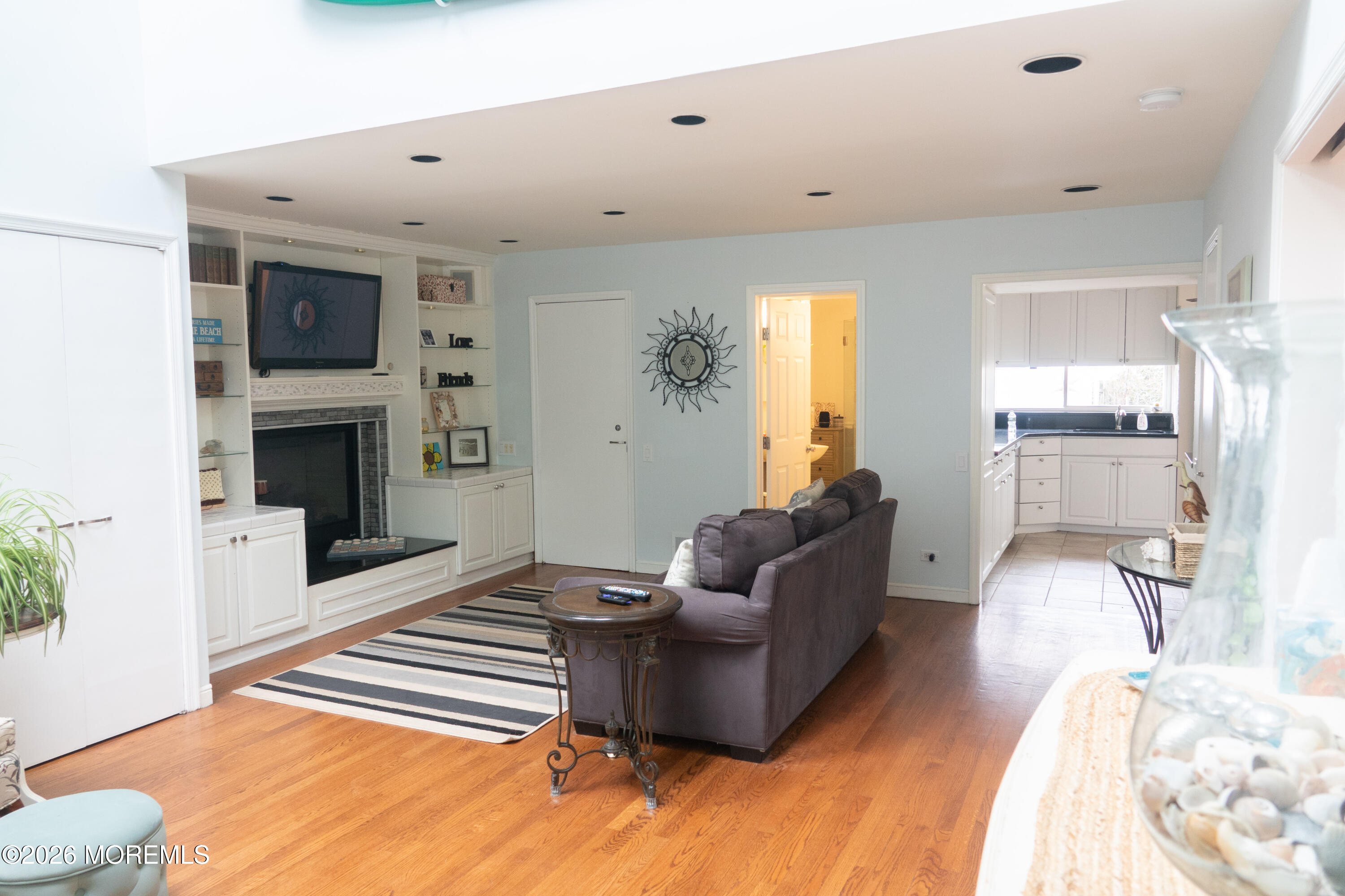 480 Staffa Street Allenhurst, NJ 07711 - Photo 14 of 30 a living room with furniture and a fireplace