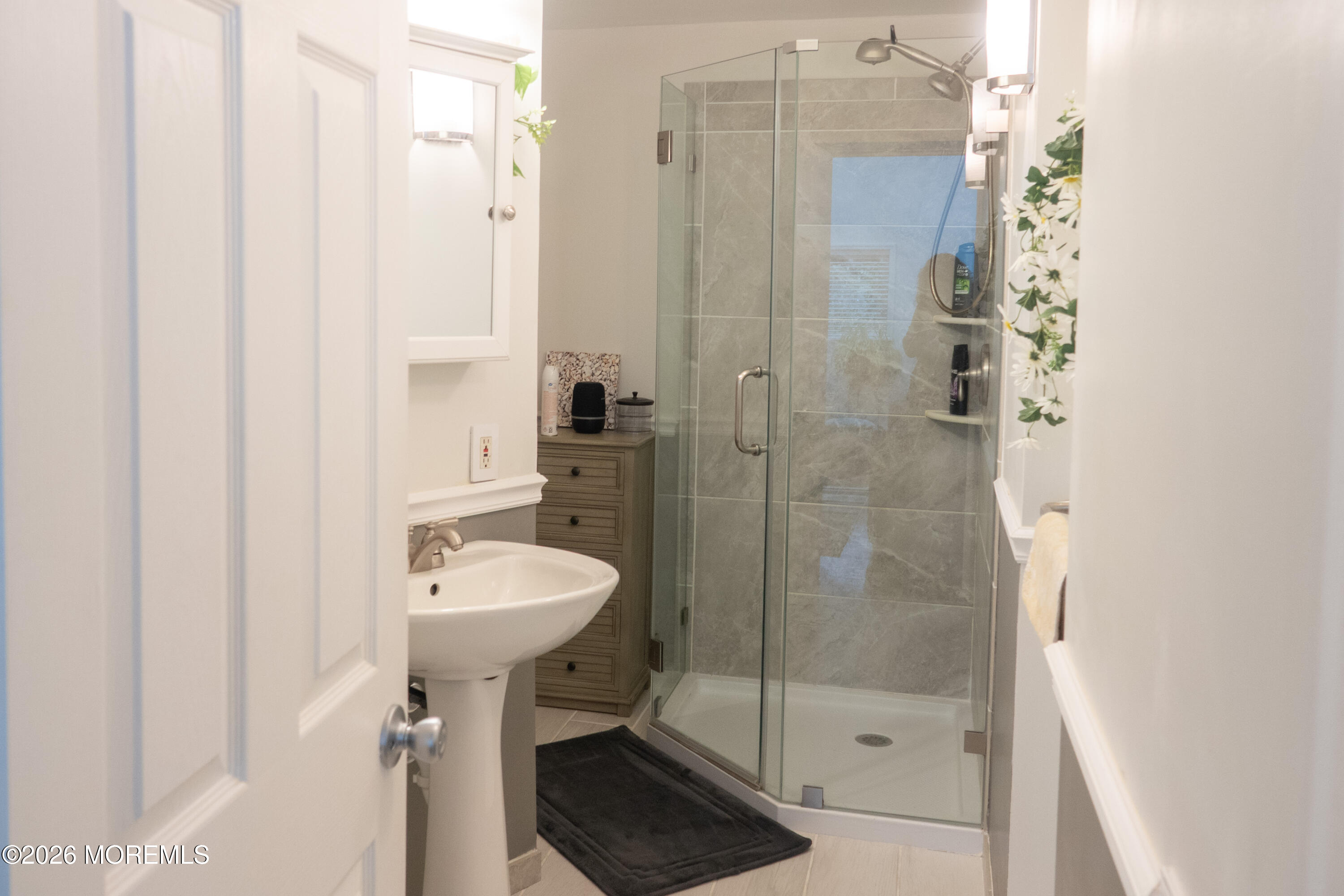 480 Staffa Street Allenhurst, NJ 07711 - Photo 20 of 30 a bathroom with a sink toilet and shower