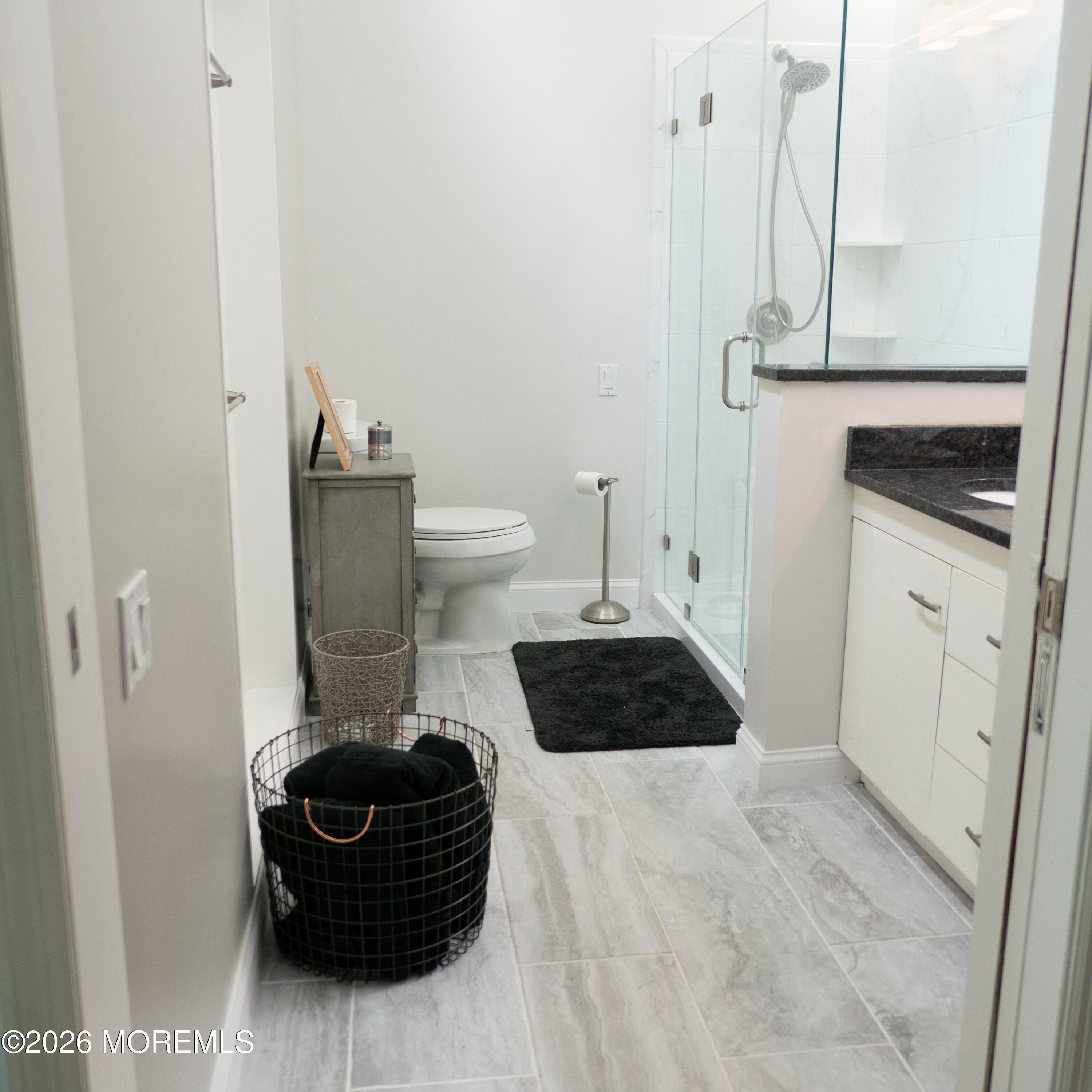 480 Staffa Street Allenhurst, NJ 07711 - Photo 24 of 30 a bedroom with a bed and a stove