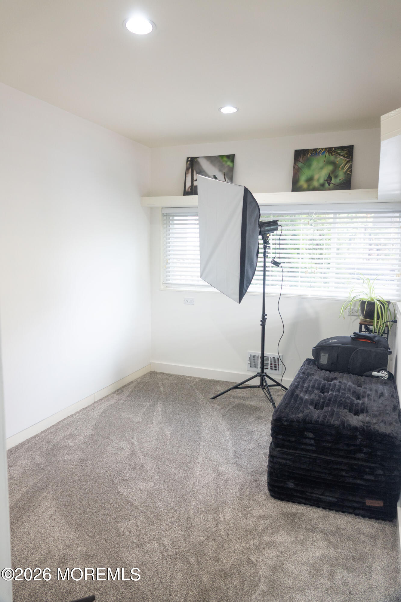 480 Staffa Street Allenhurst, NJ 07711 - Photo 9 of 30 a bedroom with a bed and a window