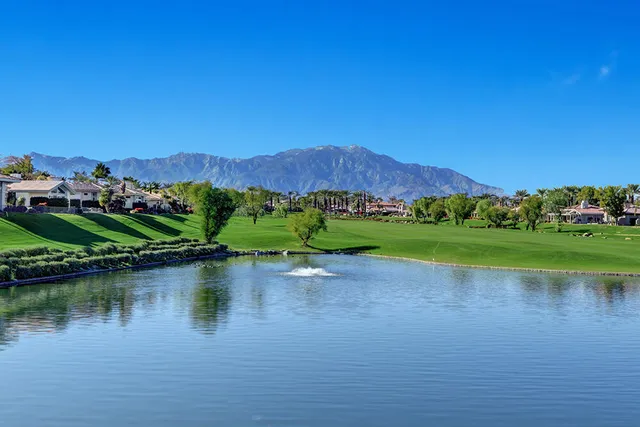 a view of a lake with a mountain in the background