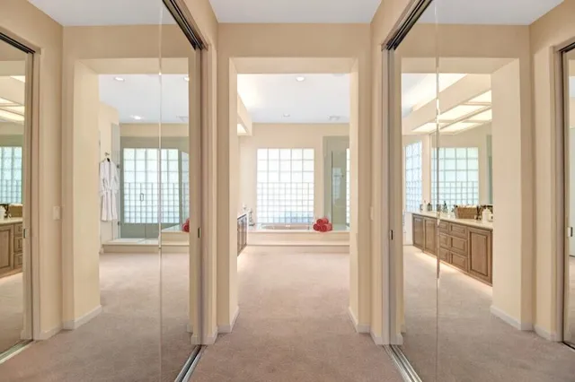 a view of a livingroom from a hallway