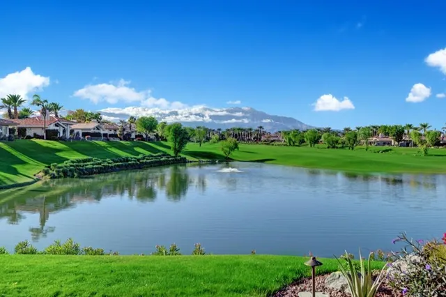 a view of a lake with a city