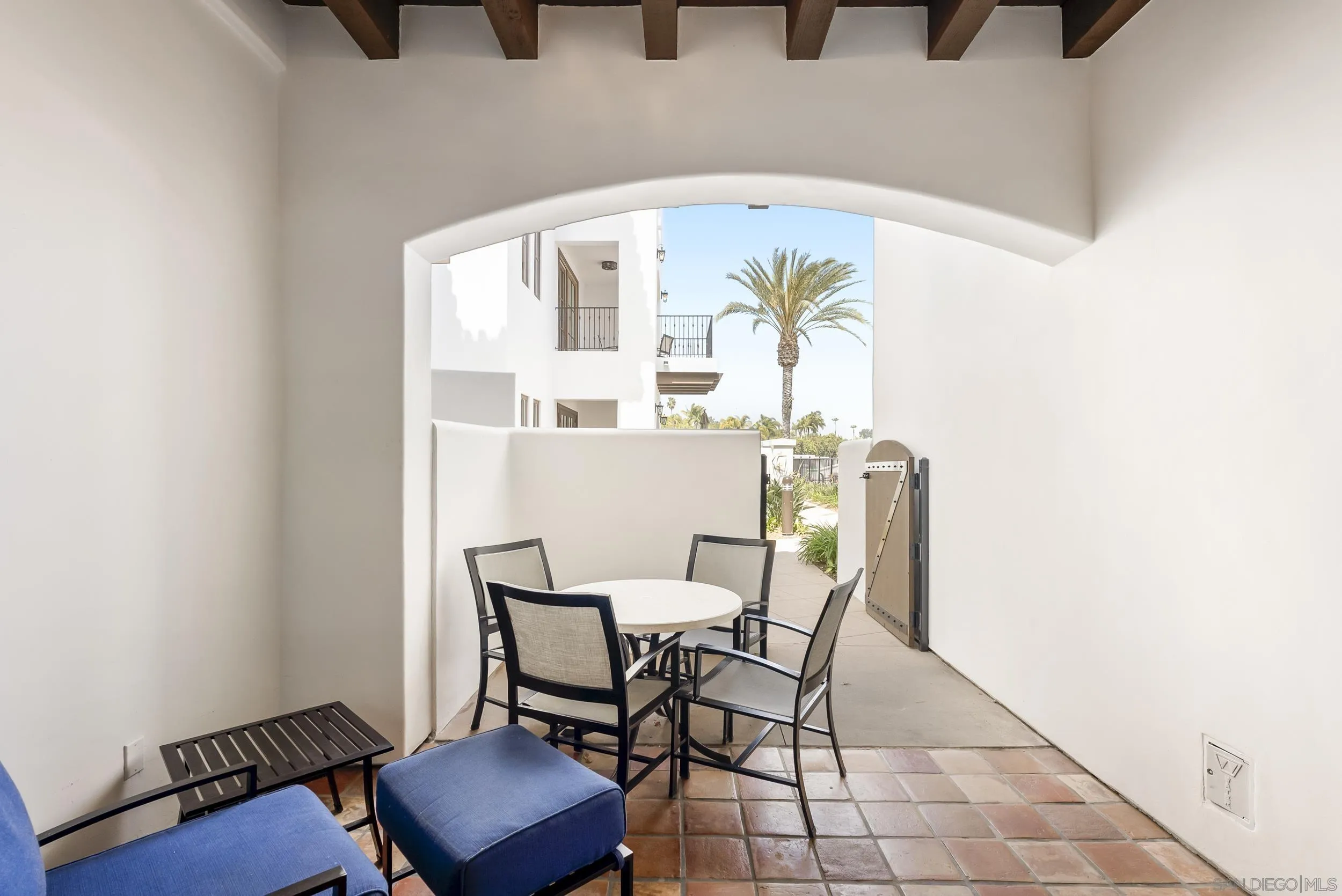 7310 Estrella De Mar Road, Unit 3 Carlsbad, CA 92009 - Photo 22 of 32 a dining room with furniture and window