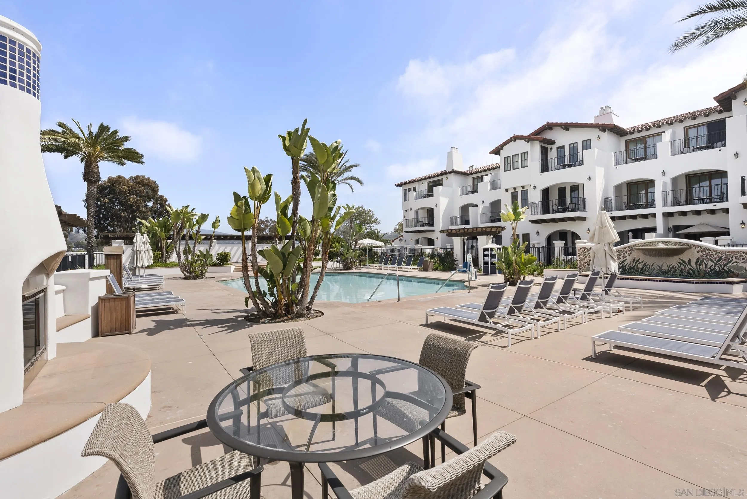 7310 Estrella De Mar Road, Unit 3 Carlsbad, CA 92009 - Photo 27 of 32 a view of a swimming pool with a patio