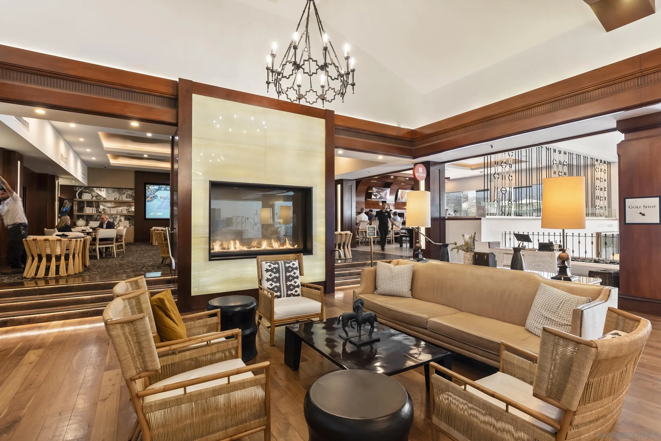 7310 Estrella De Mar Road, Unit 3 Carlsbad, CA 92009 - Photo 30 of 32 a living room with furniture and a large window