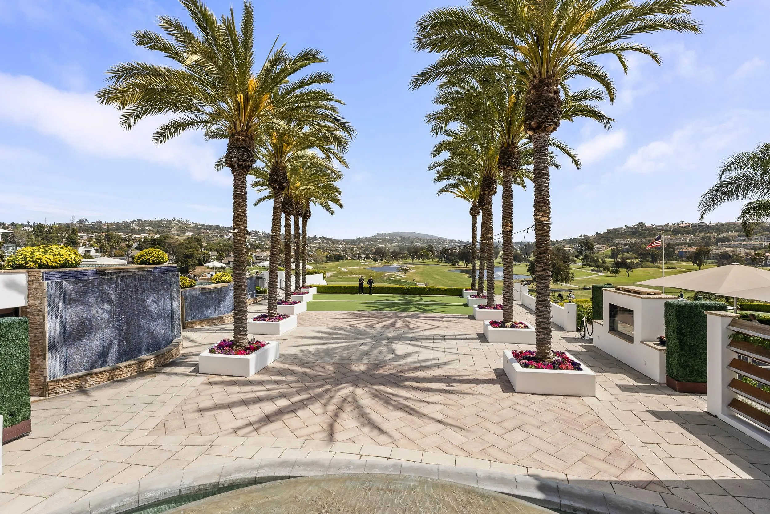 7310 Estrella De Mar Road, Unit 3 Carlsbad, CA 92009 - Photo 31 of 32 a view of a ocean with palm trees