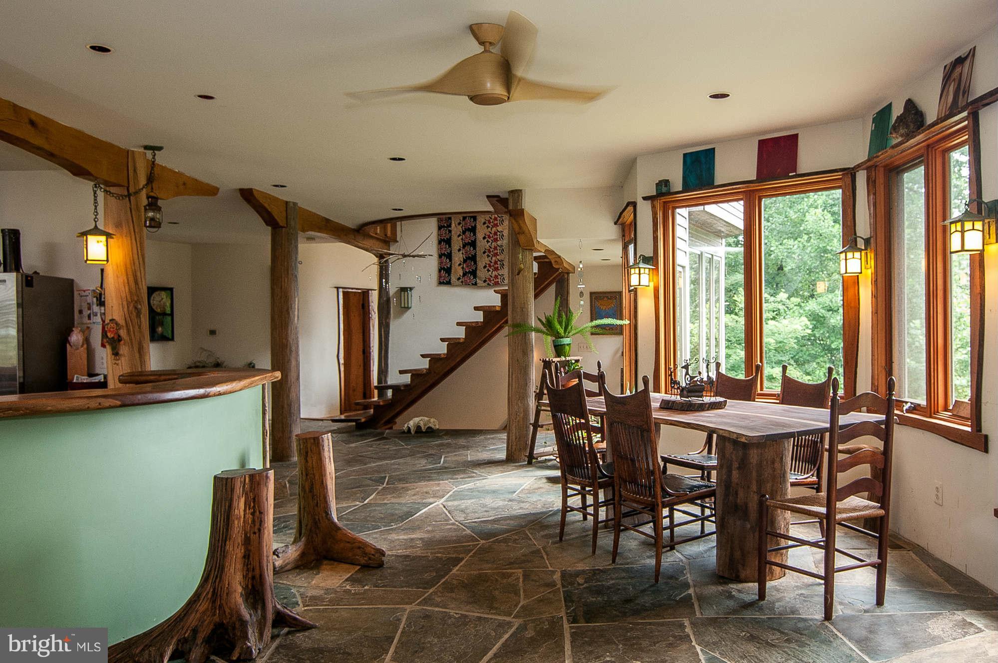 347 Fairhaven Road Tracys Landing, MD 20779 - Photo 6 of 26 a view of a dining room with furniture window and outside view
