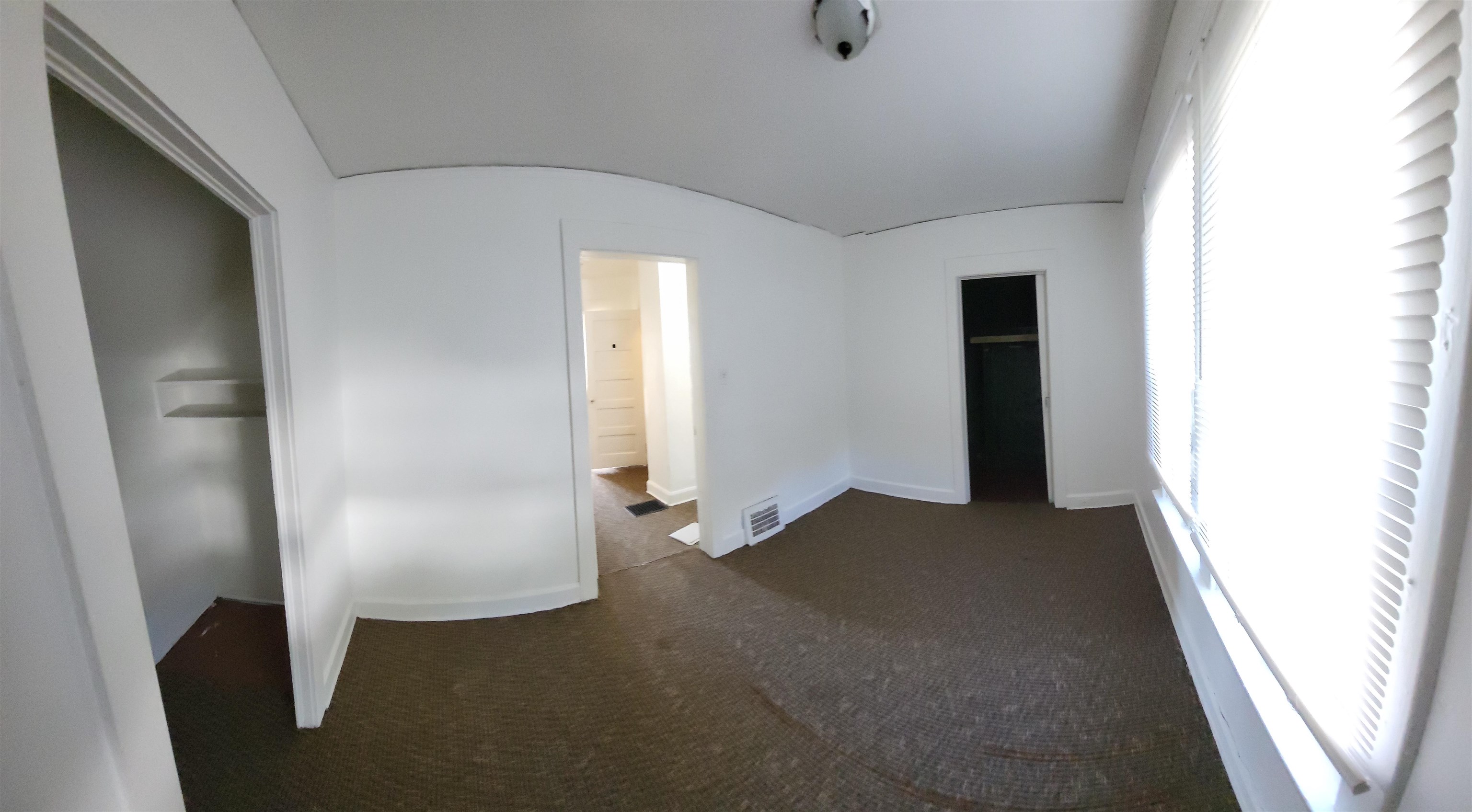 1433 5th Avenue Rockford, IL 61104 - Photo 11 of 19 a view of an empty room with a window