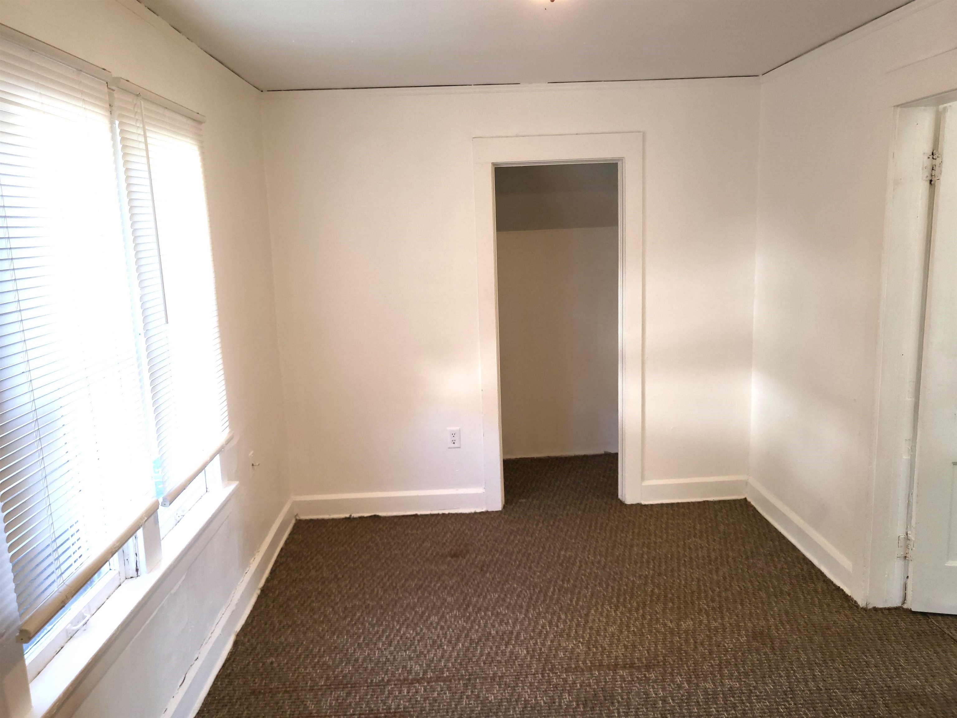 1433 5th Avenue Rockford, IL 61104 - Photo 13 of 19 an empty room with windows