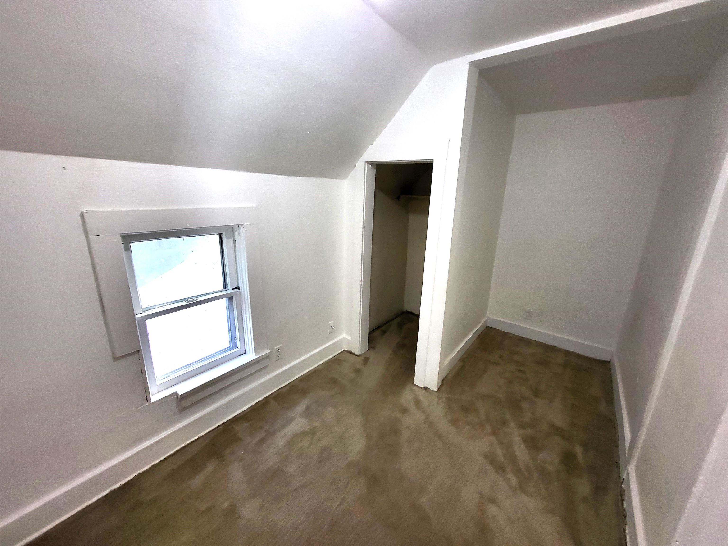 1433 5th Avenue Rockford, IL 61104 - Photo 18 of 19 an empty room with windows