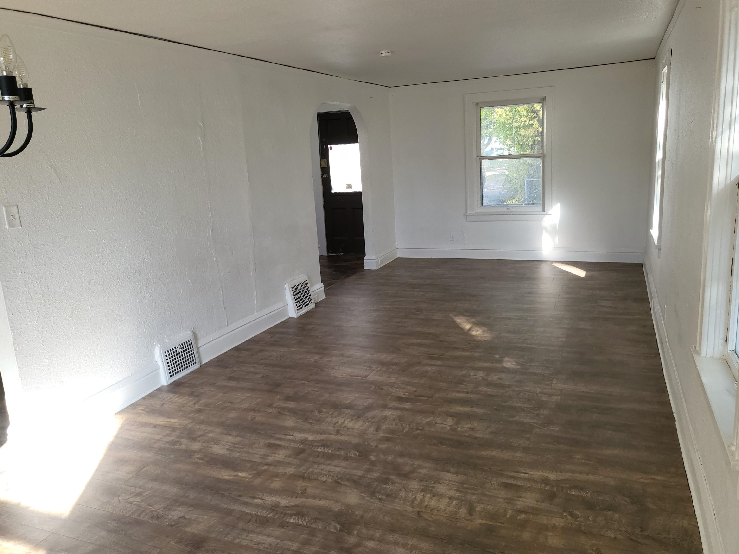 1433 5th Avenue Rockford, IL 61104 - Photo 9 of 19 a view of a room with window and wooden floor