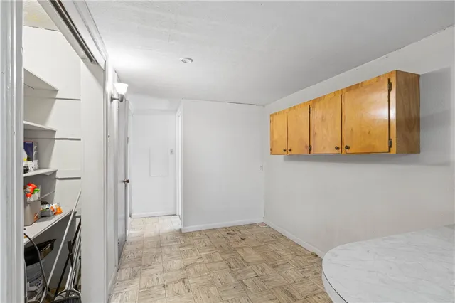 a view of a hallway with closet