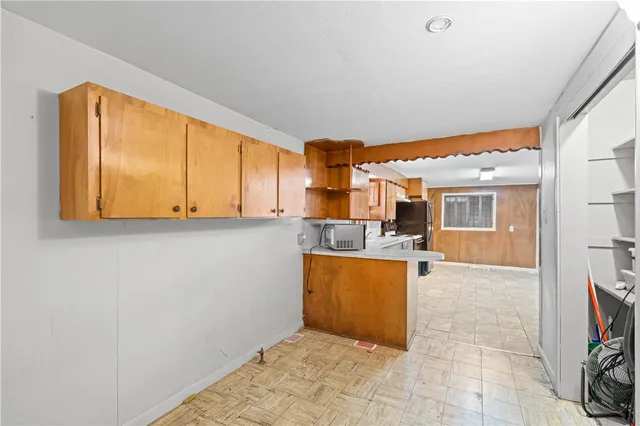 a view of kitchen and utility room
