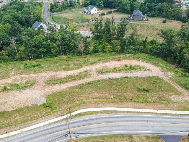 a view of a backyard of a house