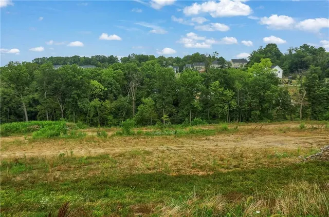 a view of outdoor space with deck and yard