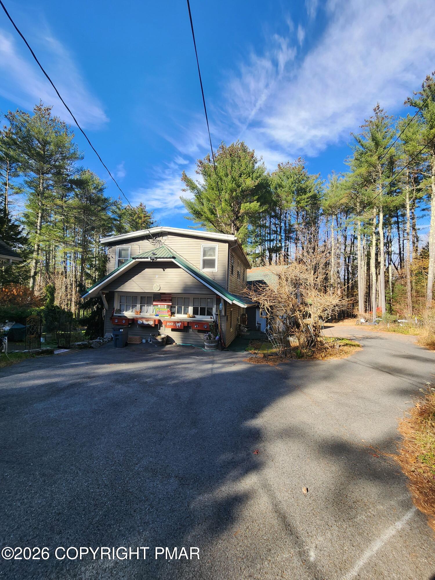 873 Lower Swiftwater Road, Unit 201 Cresco, PA 18326 - Photo 1 of 10 a view of a street with a building in the background