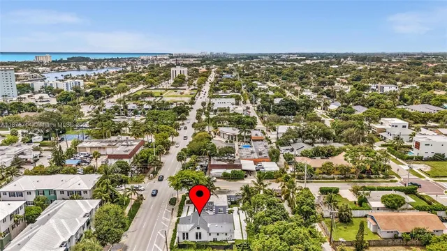 an aerial view of residential building with parking space
