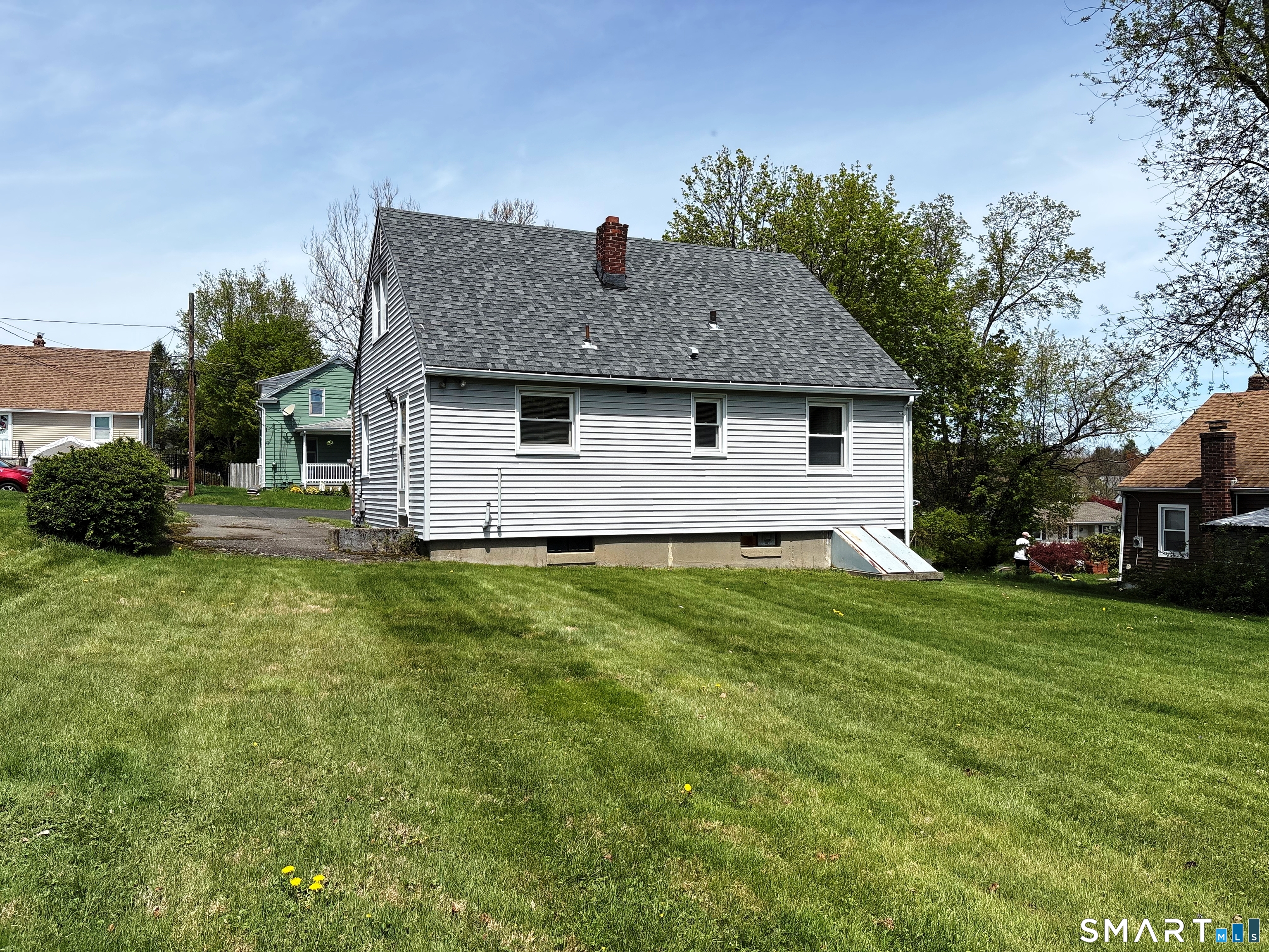 20 Garibaldi Street Watertown, CT 06779 - Photo 15 of 16 a front view of house with yard and trees