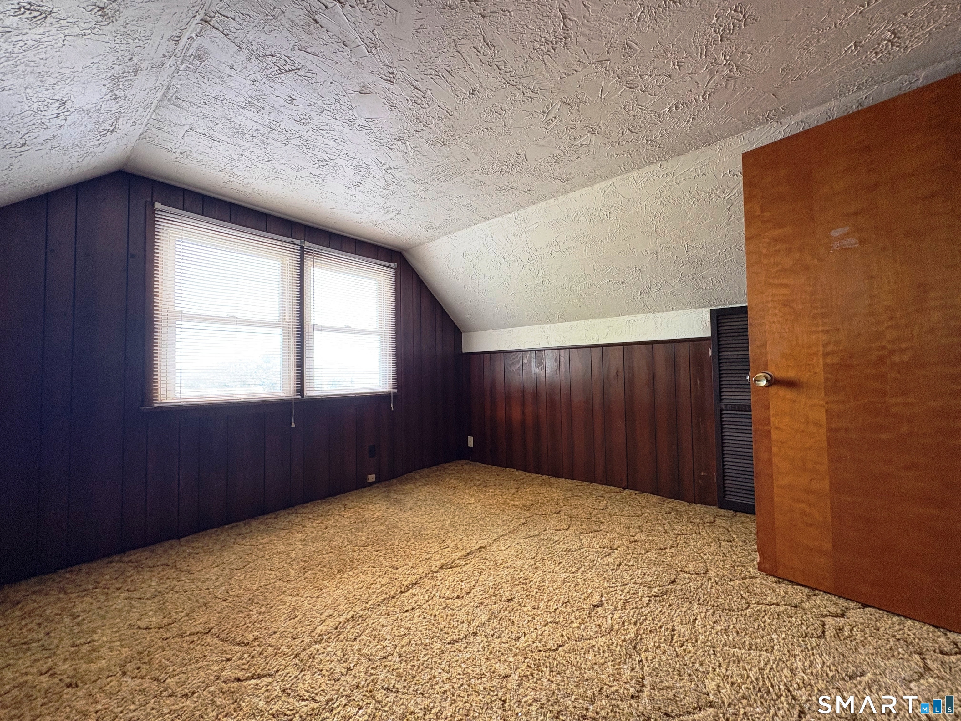 20 Garibaldi Street Watertown, CT 06779 - Photo 5 of 16 an empty room with a window