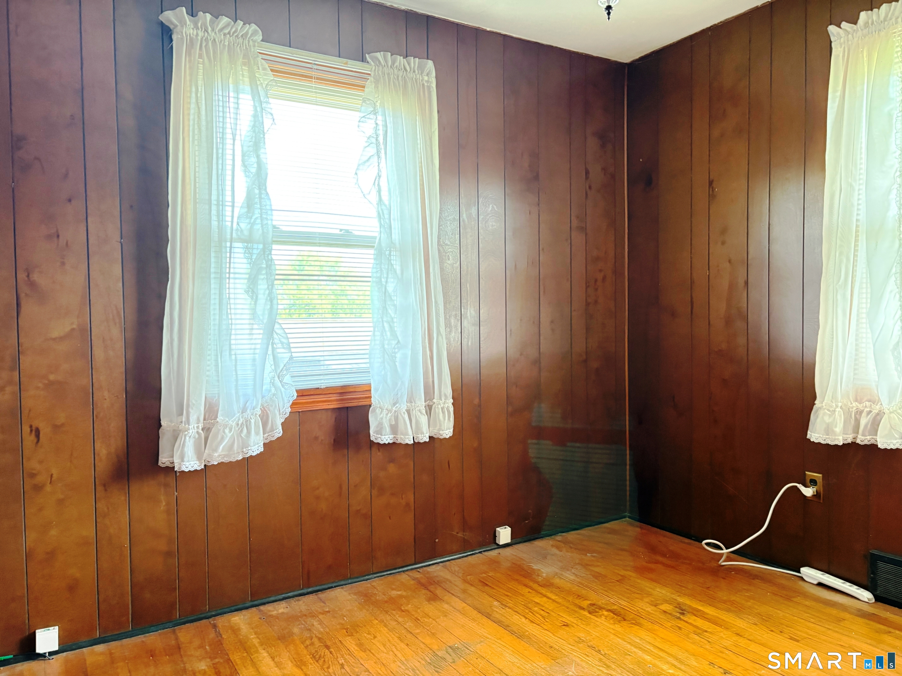 20 Garibaldi Street Watertown, CT 06779 - Photo 8 of 16 a bedroom with a bed and a window