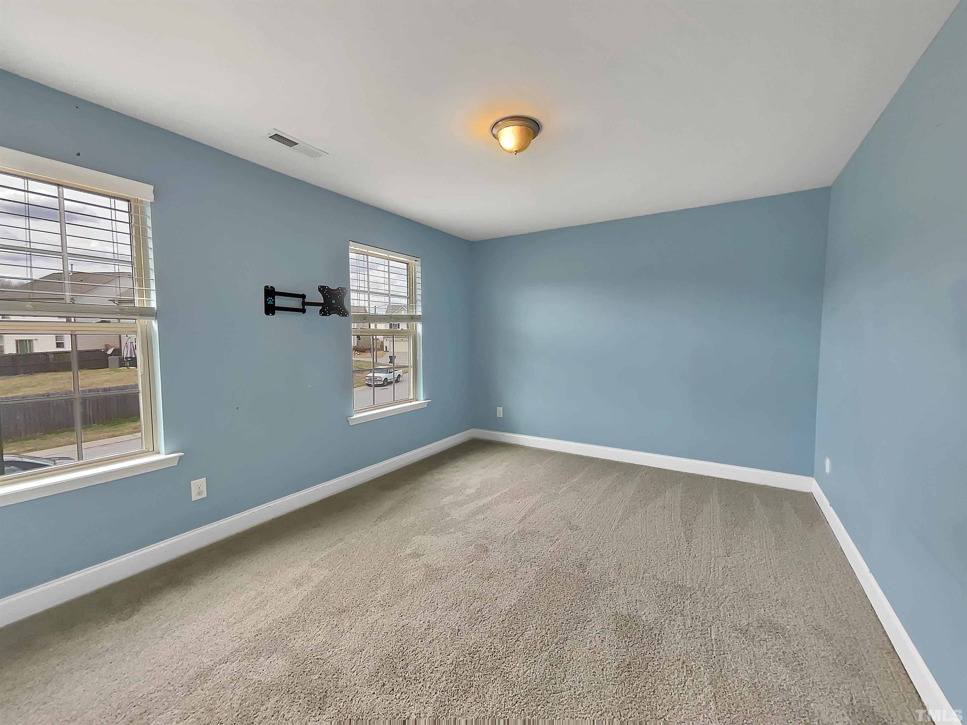 2709 Communion Court Raleigh, NC 27610 - Photo 15 of 18 a view of an empty room with a window