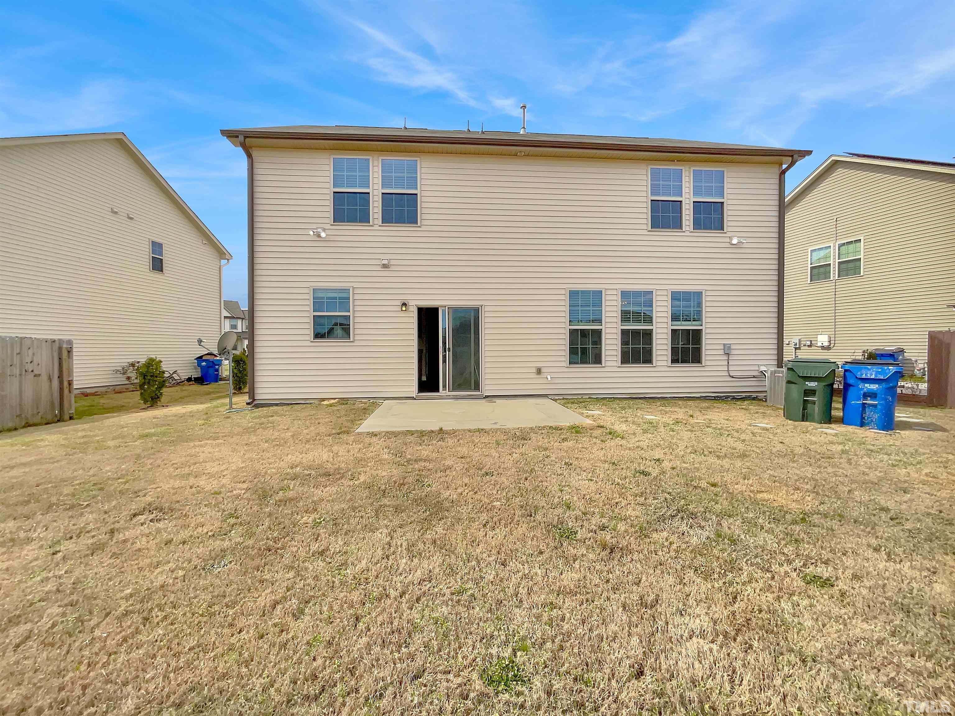 2709 Communion Court Raleigh, NC 27610 - Photo 5 of 18 a front view of a house with a yard