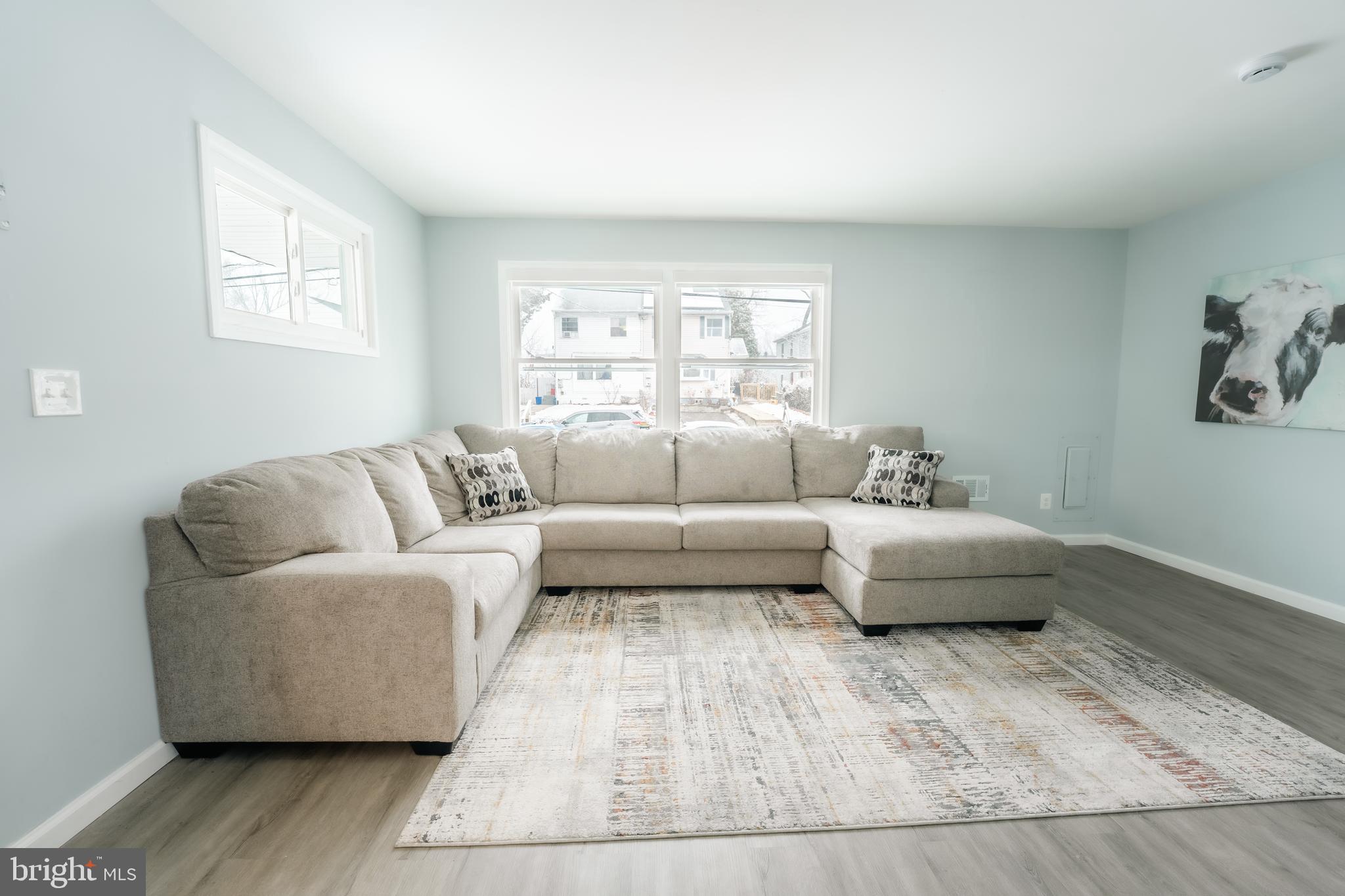 3410 Embry Street Silver Spring, MD 20902 - Photo 25 of 28 a living room with furniture and a couch
