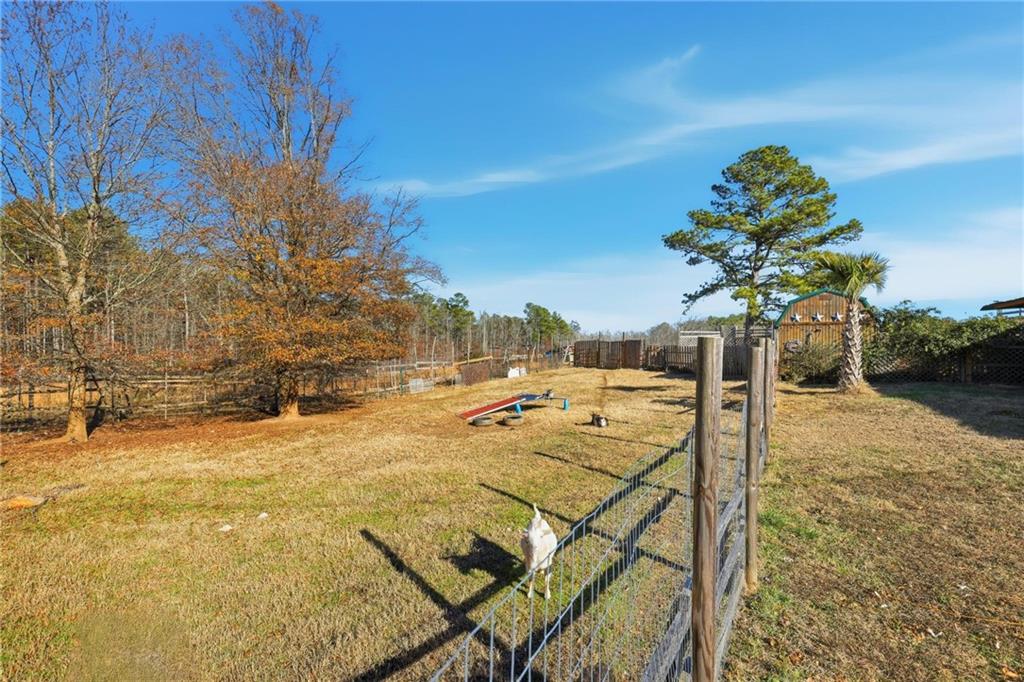 415 Tapley Road Villa Rica, GA 30180 - Photo 13 of 25 a view of a terrace with chairs
