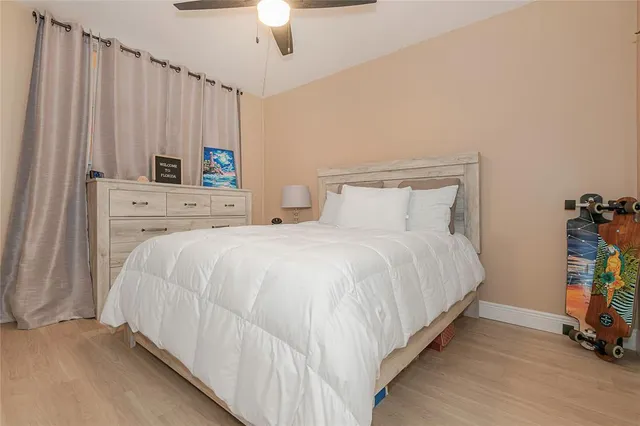 a bed room with a bed and a tv