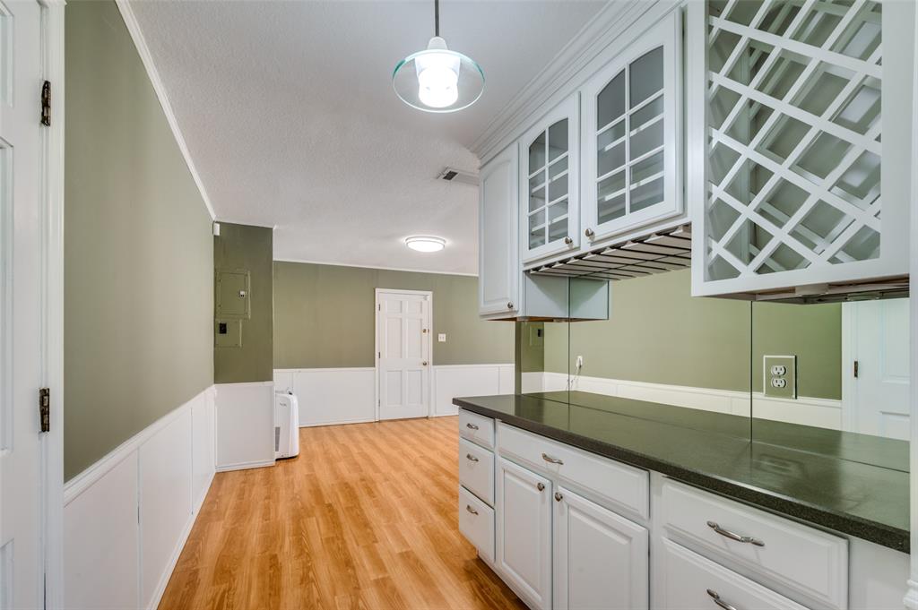 1501 Ridgeview Drive Arlington, TX 76012 - Photo 12 of 32 a spacious bathroom with a granite countertop sink and a mirror