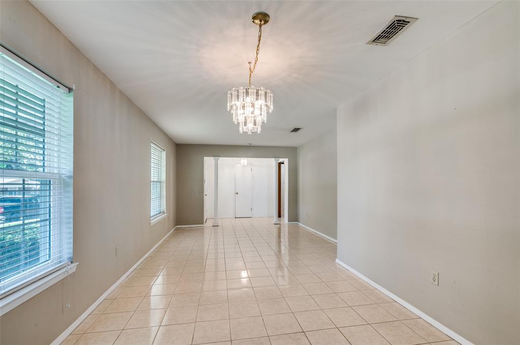 1501 Ridgeview Drive Arlington, TX 76012 - Photo 15 of 32 a view of a chandelier in a room