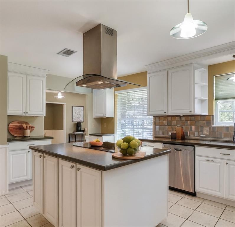 1501 Ridgeview Drive Arlington, TX 76012 - Photo 2 of 32 a kitchen with stainless steel appliances a sink a stove and cabinets