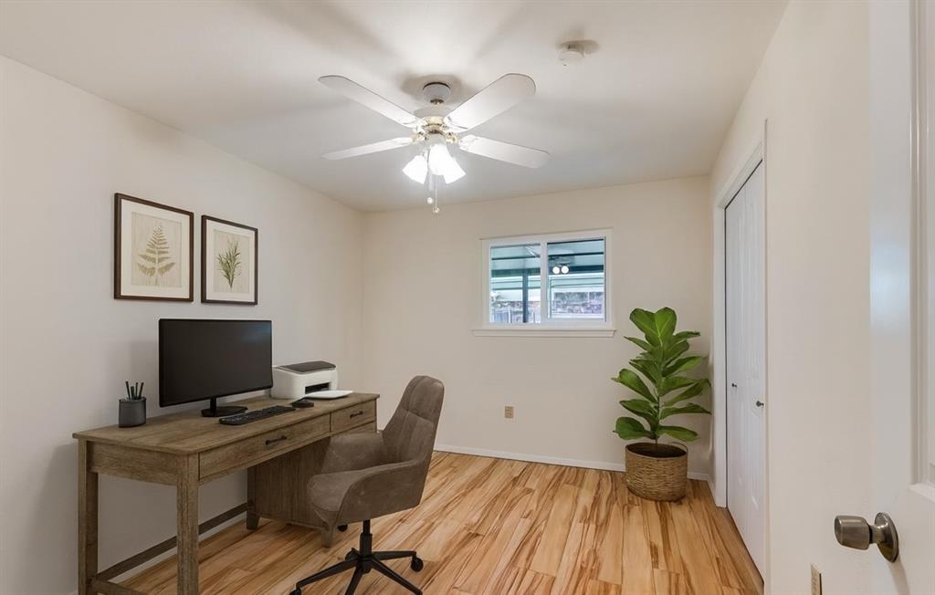1501 Ridgeview Drive Arlington, TX 76012 - Photo 8 of 32 a view of a workspace with furniture and a window