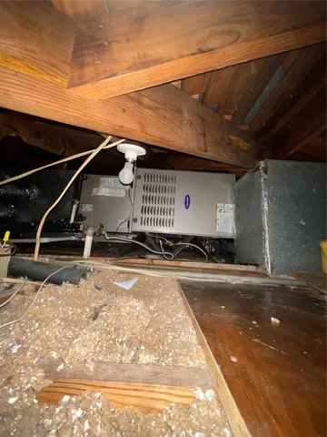 a bathroom with a toilet and a bathtub