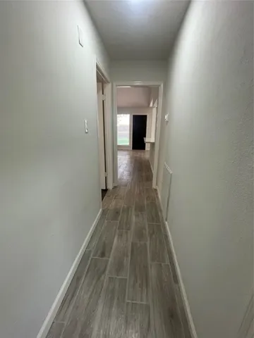 a view of a room with an empty space