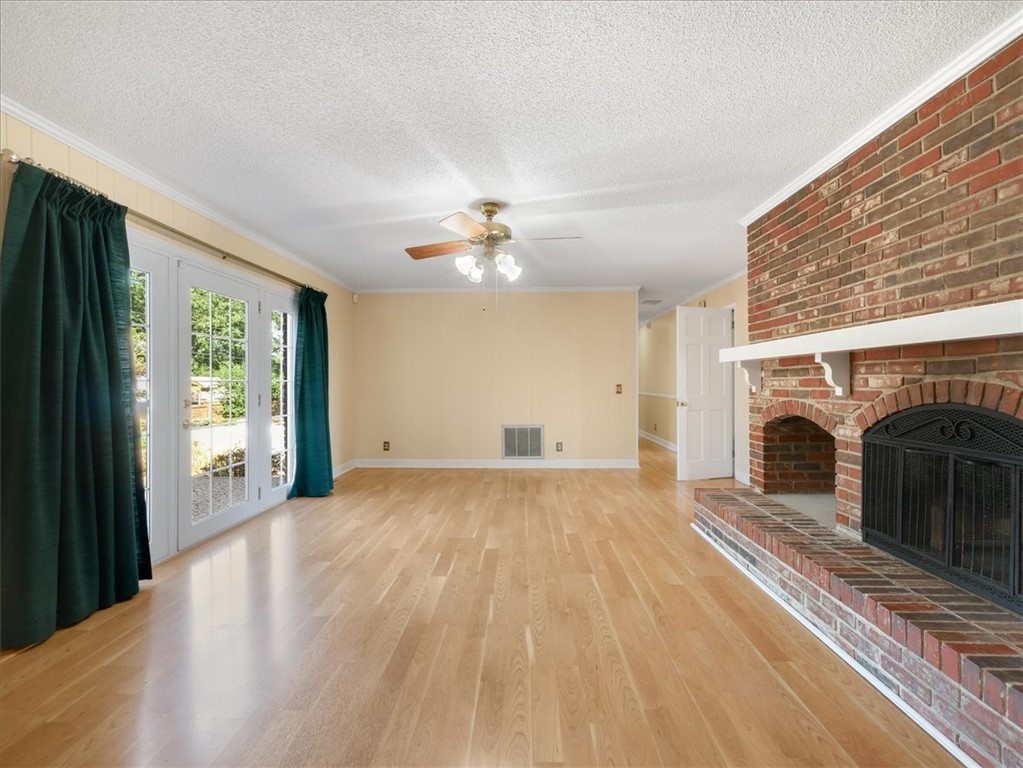 808 West Greer Street Honea Path, SC 29654 - Photo 27 of 48 Living room with a view of the back yard and pool