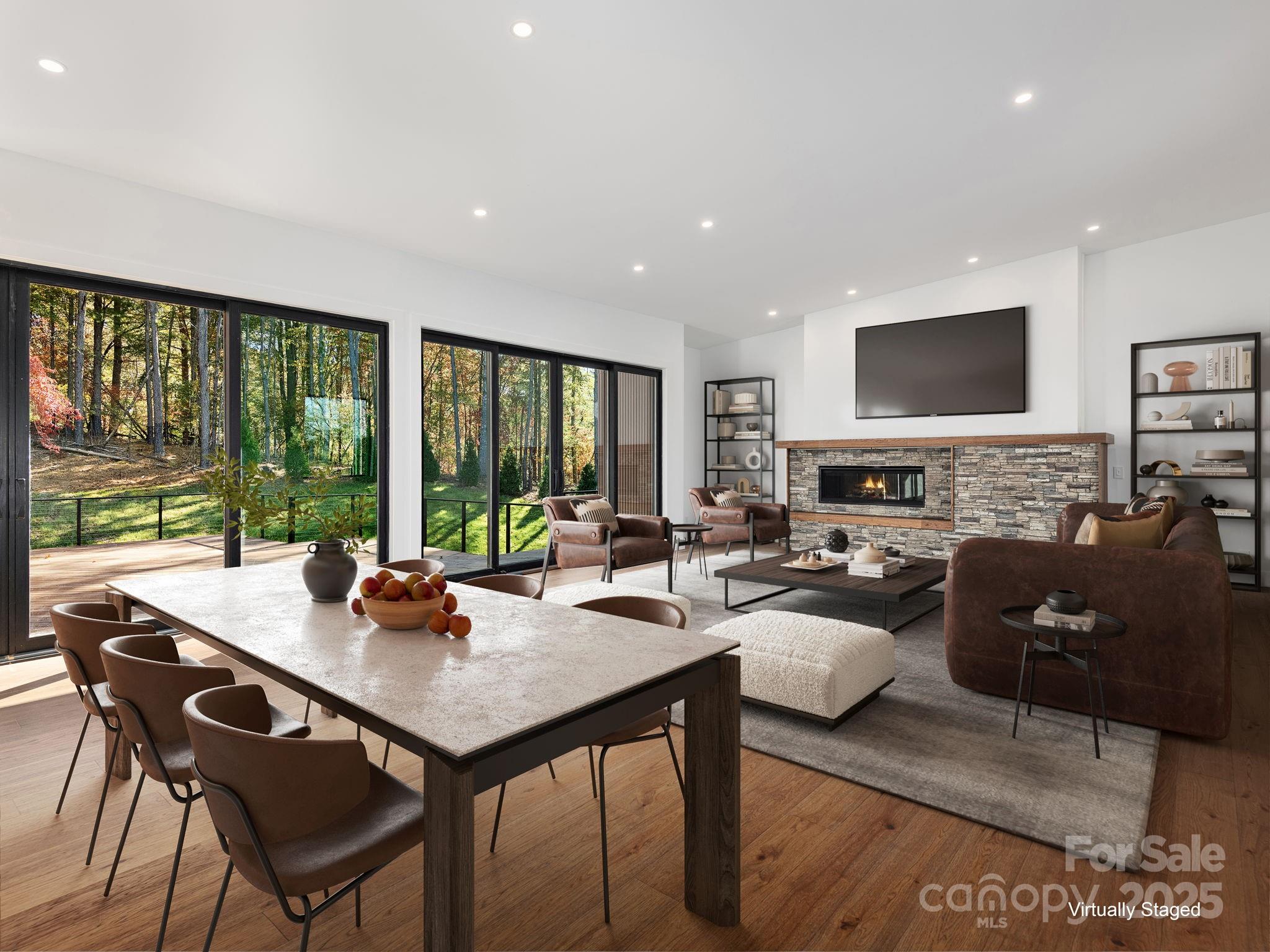 a living room with fireplace furniture and a flat screen tv