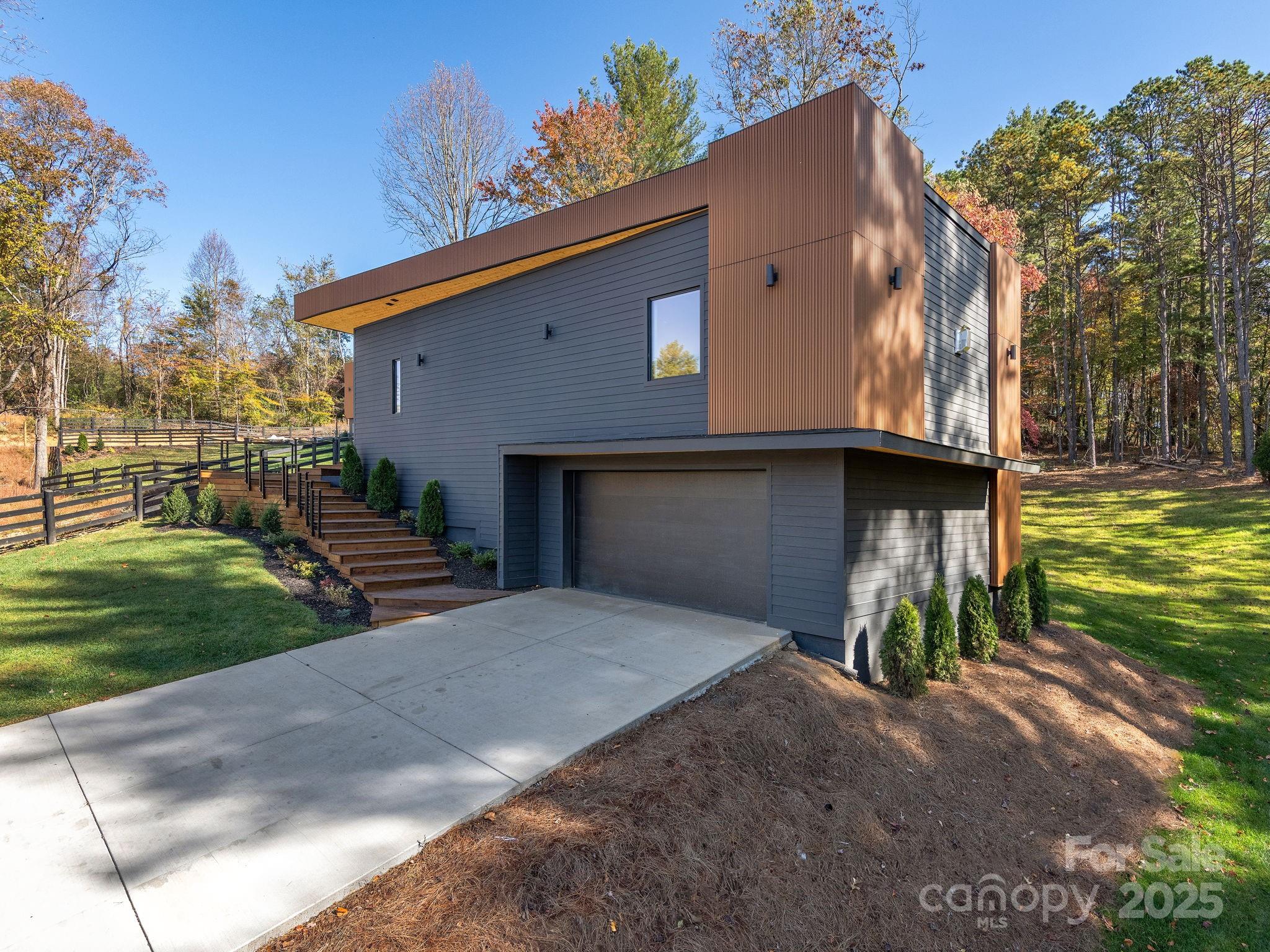 87 Verbania Rd Mills River Mills River, NC 28759 - Photo 23 of 27 a view of a house with a yard