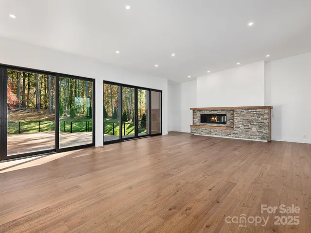 a kitchen with stainless steel appliances granite countertop a stove and a sink