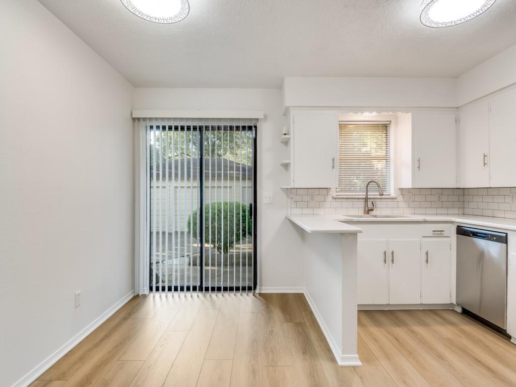 7415-7417 Walling Lane Dallas, TX 75231 - Photo 7 of 25 a view of a kitchen from the hallway