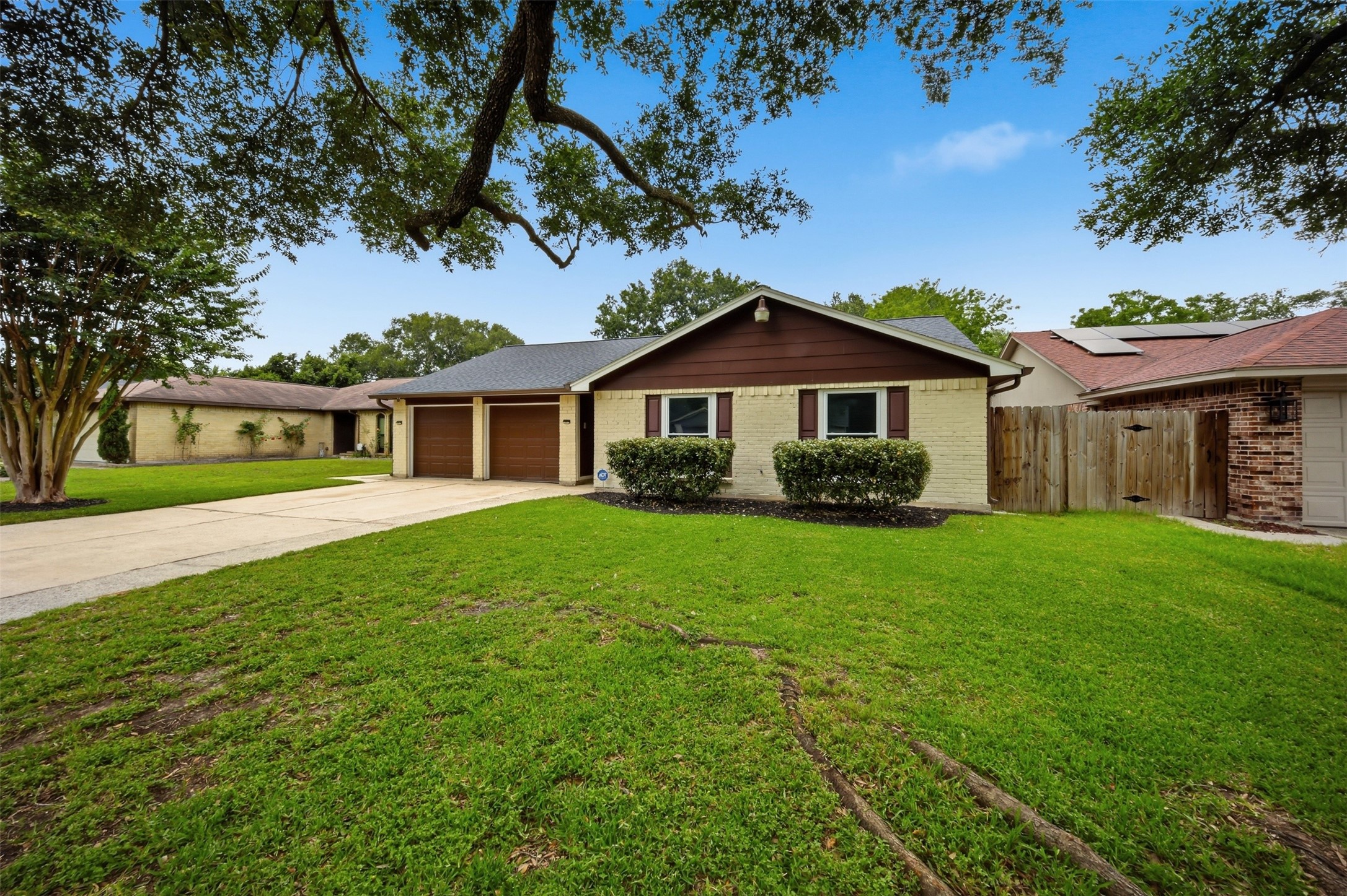 9418 Kilrenny Drive Spring, TX 77379 - Photo 37 of 47 a front view of a house with a garden