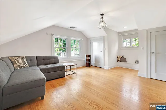 a view of a backyard with sitting area