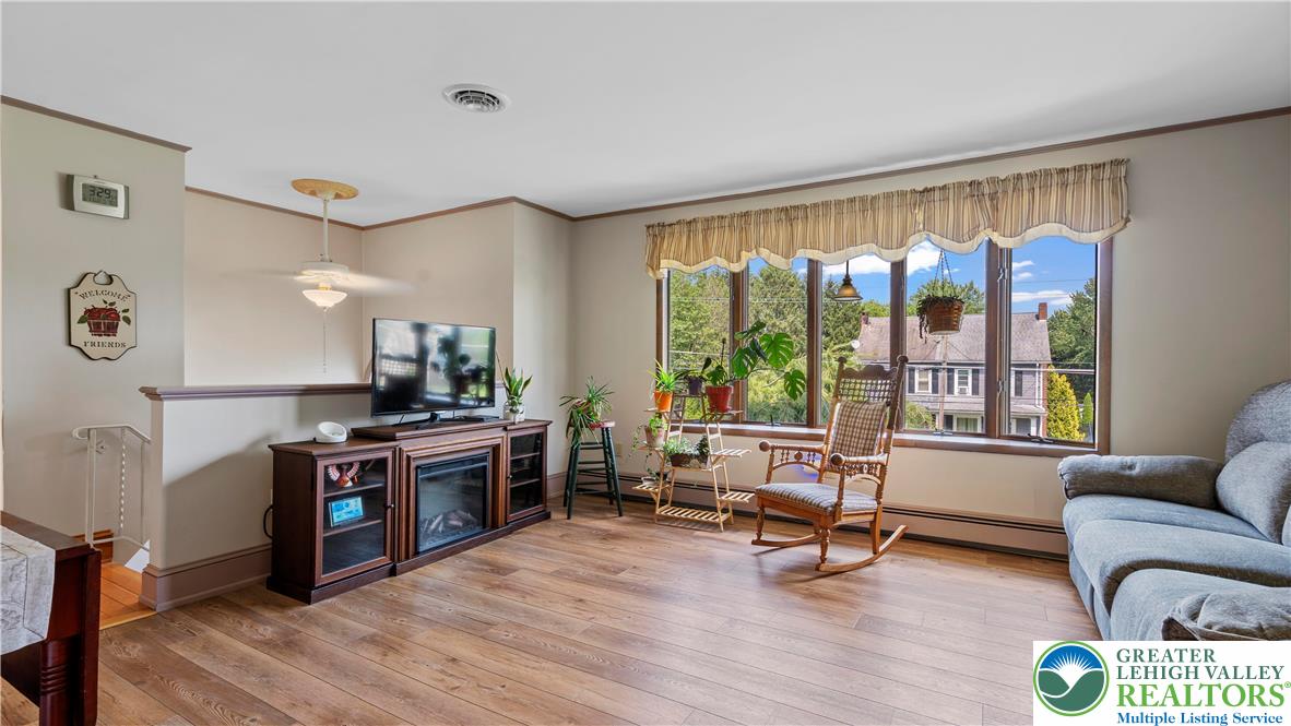 807 Bangor Road Nazareth, PA 18064 - Photo 17 of 46 a living room with furniture and a flat screen tv