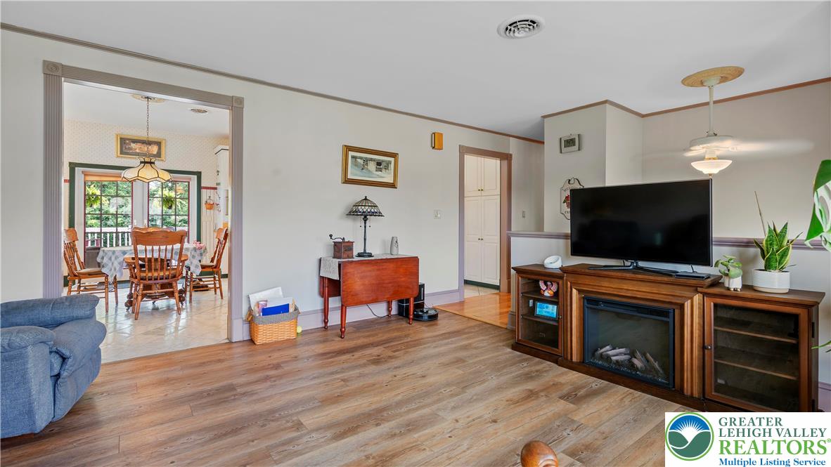 807 Bangor Road Nazareth, PA 18064 - Photo 18 of 46 a living room with furniture and a flat screen tv