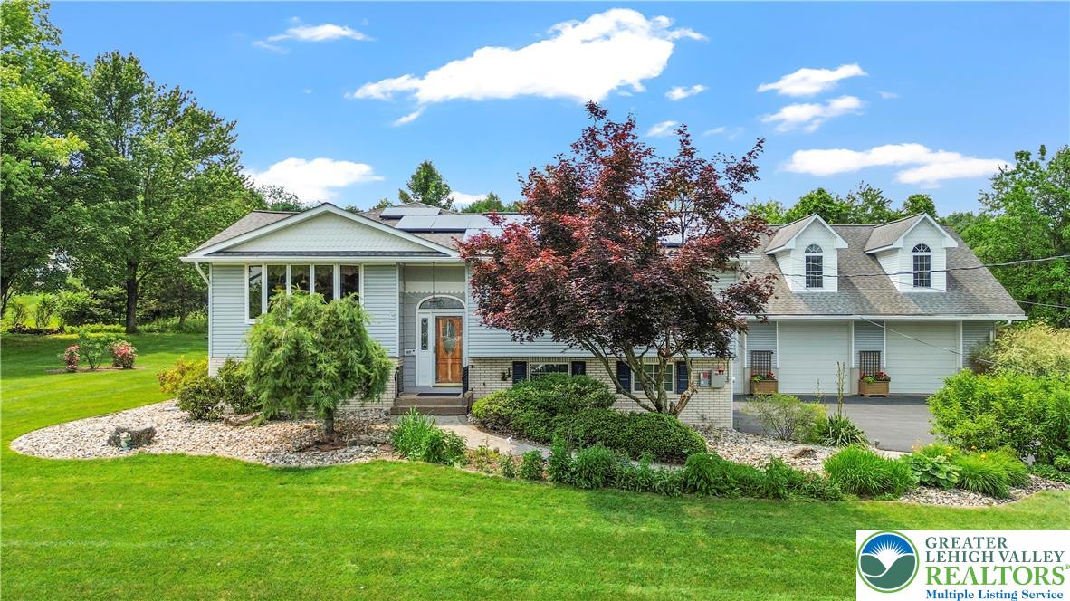 807 Bangor Road Nazareth, PA 18064 - Photo 2 of 46 a front view of a house with a yard