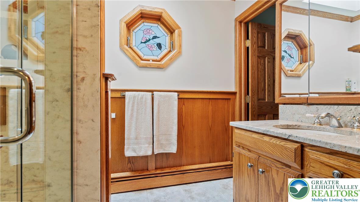 807 Bangor Road Nazareth, PA 18064 - Photo 28 of 46 a bathroom with a sink and a mirror