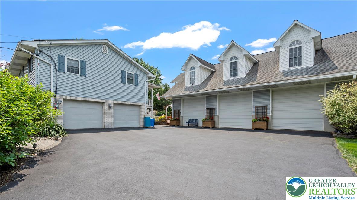 807 Bangor Road Nazareth, PA 18064 - Photo 3 of 46 a view of a house with a garage