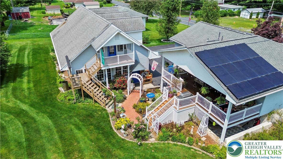 807 Bangor Road Nazareth, PA 18064 - Photo 8 of 46 an aerial view of a house with swimming pool and garden